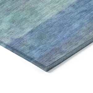 Photo of Blue And Ivory Abstract Washable Indoor Outdoor Area Rug