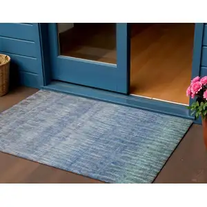 Photo of Blue And Ivory Abstract Washable Indoor Outdoor Area Rug