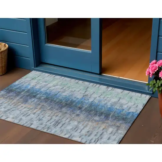 Blue And Ivory Abstract Washable Indoor Outdoor Area Rug Photo 1
