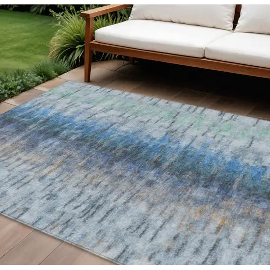 Blue And Ivory Abstract Washable Indoor Outdoor Area Rug Photo 1