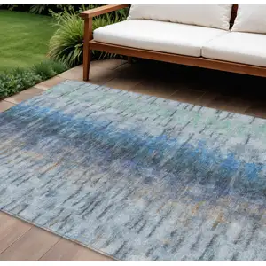 Photo of Blue And Ivory Abstract Washable Indoor Outdoor Area Rug