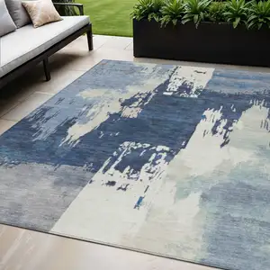 Photo of Blue And Ivory Abstract Washable Indoor Outdoor Area Rug