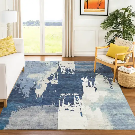 Blue And Ivory Abstract Washable Indoor Outdoor Area Rug Photo 9