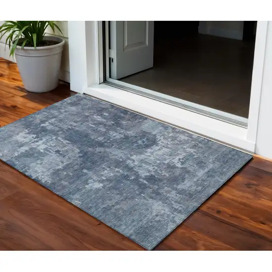 Blue And Ivory Abstract Washable Indoor Outdoor Area Rug Photo 1