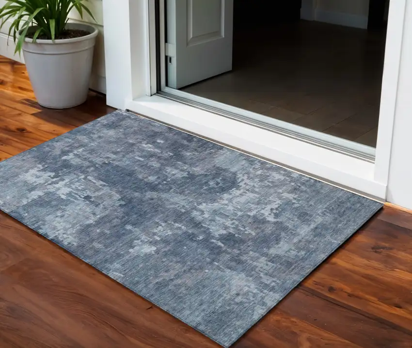 Blue And Ivory Abstract Washable Indoor Outdoor Area Rug Photo 1