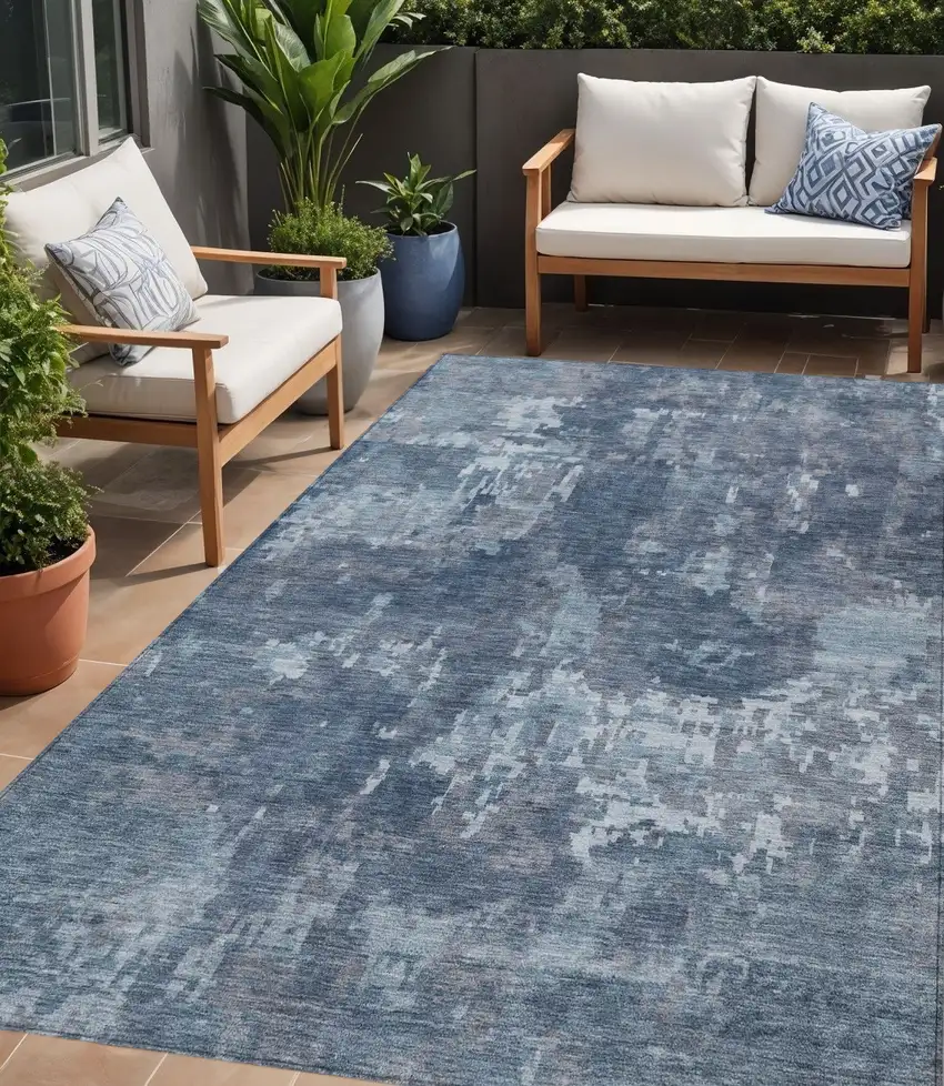Blue And Ivory Abstract Washable Indoor Outdoor Area Rug Photo 1