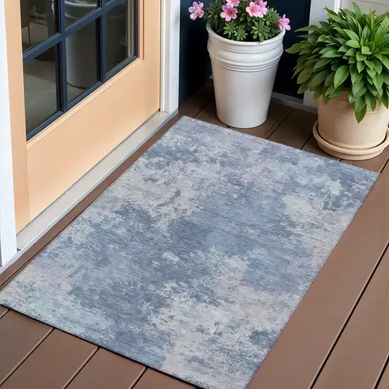 Blue And Ivory Abstract Washable Indoor Outdoor Area Rug Photo 1