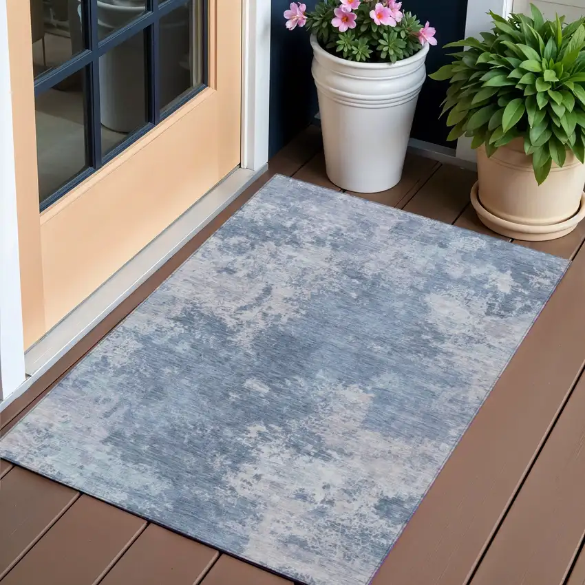 Blue And Ivory Abstract Washable Indoor Outdoor Area Rug Photo 1