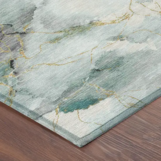Blue And Ivory Abstract Washable Indoor Outdoor Area Rug Photo 4