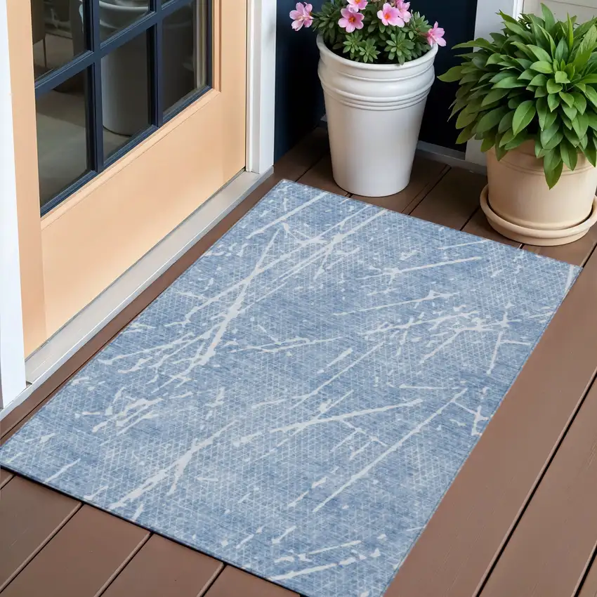 Blue And Ivory Abstract Washable Indoor Outdoor Area Rug Photo 1
