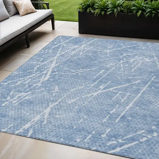 Blue And Ivory Abstract Washable Indoor Outdoor Area Rug Photo 1