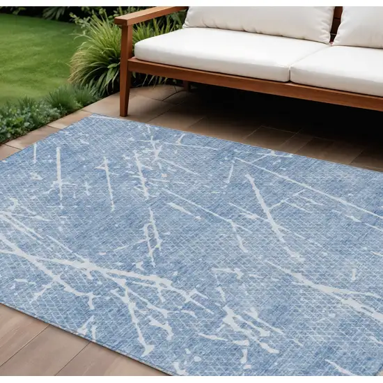 Blue And Ivory Abstract Washable Indoor Outdoor Area Rug Photo 1