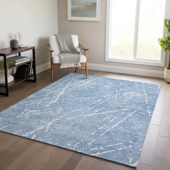 Blue And Ivory Abstract Washable Indoor Outdoor Area Rug Photo 6