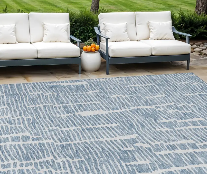 Blue And Ivory Abstract Washable Indoor Outdoor Area Rug Photo 1