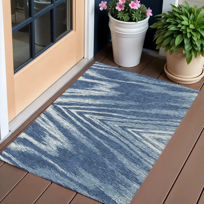 Blue And Ivory Abstract Washable Indoor Outdoor Area Rug Photo 1