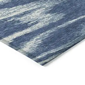 Photo of Blue And Ivory Abstract Washable Indoor Outdoor Area Rug
