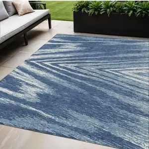 Photo of Blue And Ivory Abstract Washable Indoor Outdoor Area Rug