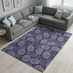 Photo of Blue And Ivory Botanical Leaves Washable Area Rug With UV Protection