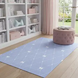 Photo of Blue And Ivory Bow Youthful Washable Area Rug