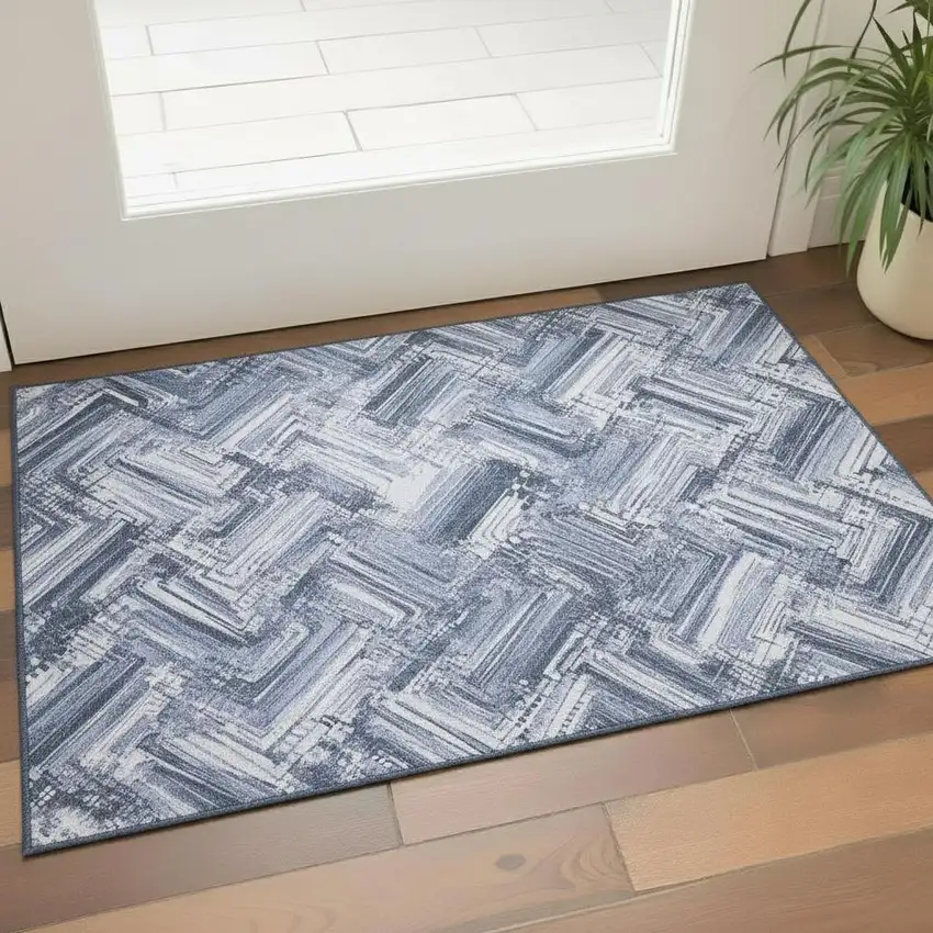 Blue And Ivory Chevron Washable Area Rug With UV Protection Photo 1