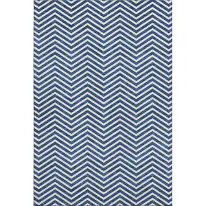 Photo of Blue And Ivory Chevron Washable Area Rug With UV Protection