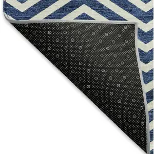 Photo of Blue And Ivory Chevron Washable Area Rug With UV Protection