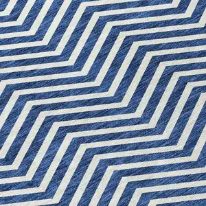 Photo of Blue And Ivory Chevron Washable Indoor Outdoor Area Rug