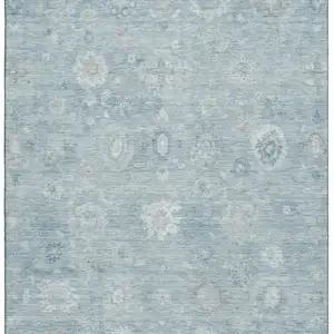 Photo of Blue And Ivory Damask Washable Area Rug With UV Protection