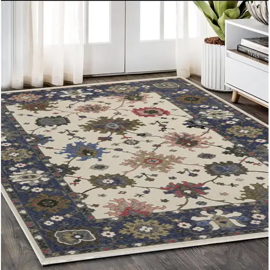 Blue And Ivory Floral Area Rug With Fringe Photo 1