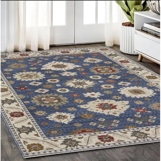Blue And Ivory Floral Area Rug With Fringe Photo 1