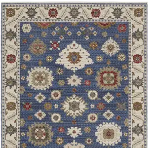 Photo of Blue And Ivory Floral Area Rug With Fringe