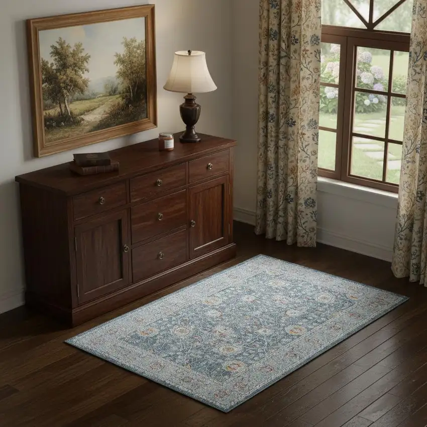 Blue And Ivory Floral Area Rug With UV Protection Photo 1