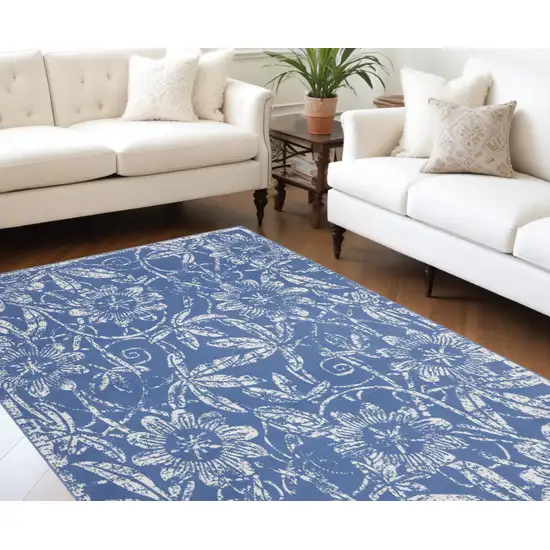 Blue And Ivory Floral Distressed Area Rug Photo 1