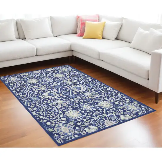 Blue And Ivory Floral Distressed Area Rug Photo 1