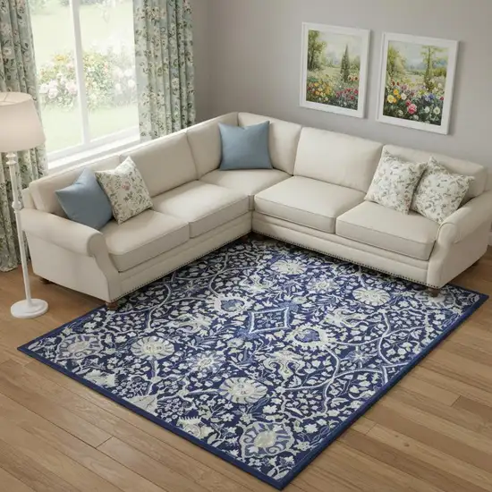 Blue And Ivory Floral Distressed Area Rug Photo 1