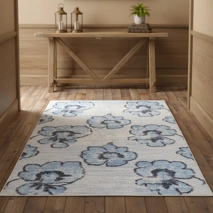 Blue And Ivory Floral Distressed Area Rug Photo 1