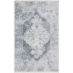 Photo of Blue And Ivory Floral Medallion Distressed Washable Area Rug