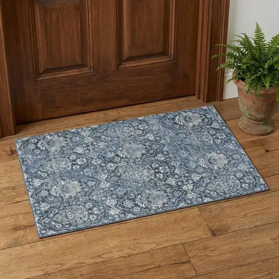 Blue And Ivory Floral Medallion Distressed Washable Area Rug With UV Protection Photo 1