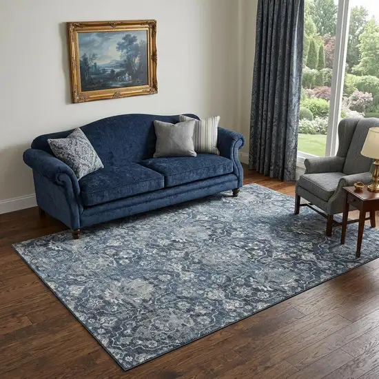 Blue And Ivory Floral Medallion Distressed Washable Area Rug With UV Protection Photo 1