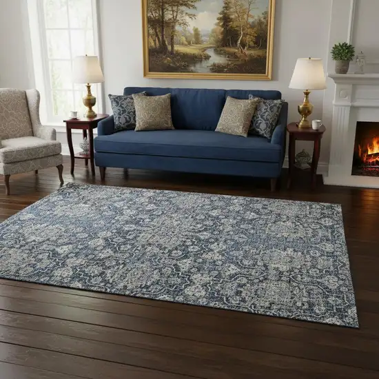 Blue And Ivory Floral Medallion Washable Area Rug With UV Protection Photo 1