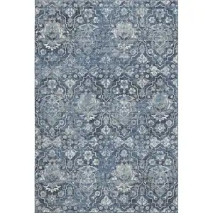 Photo of Blue And Ivory Floral Medallion Washable Area Rug With UV Protection