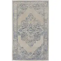 Photo of Blue And Ivory Floral Power Loom Distressed Area Rug