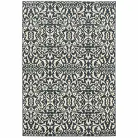 Photo of Blue And Ivory Floral Power Loom Stain Resistant Area Rug