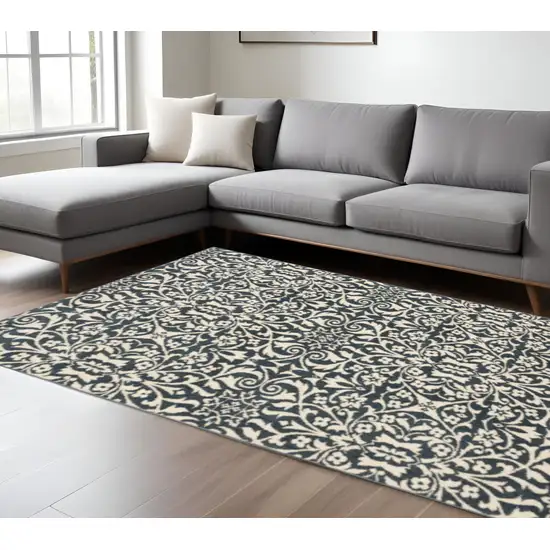 Blue And Ivory Floral Power Loom Stain Resistant Area Rug Photo 1