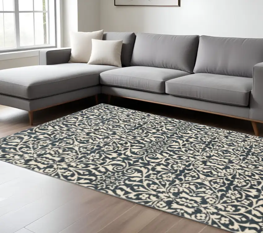 Blue And Ivory Floral Power Loom Stain Resistant Area Rug Photo 1