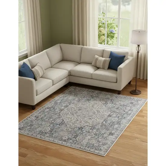 Blue And Ivory Floral Power Loom Stain Resistant Area Rug Photo 1