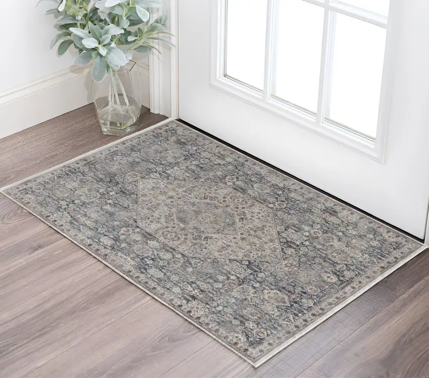 Blue and Ivory Floral Power Loom Area Rug Photo 1