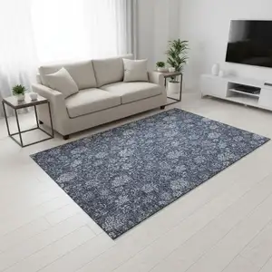 Photo of Blue And Ivory Floral Washable Area Rug With UV Protection