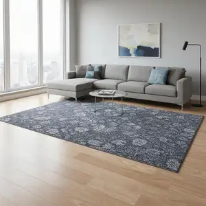Photo of Blue And Ivory Floral Washable Area Rug With UV Protection