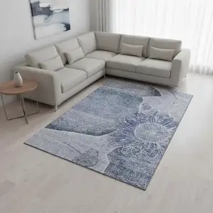 Photo of Blue And Ivory Floral Washable Area Rug With UV Protection